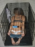 Nikki locked in the cage